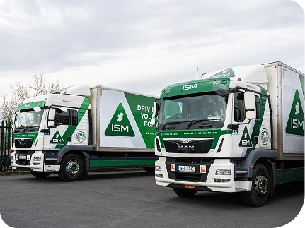 Two-large-ISM-trucks-parked-side-by-side-in-a-parking_ISM_Driving_Lessons