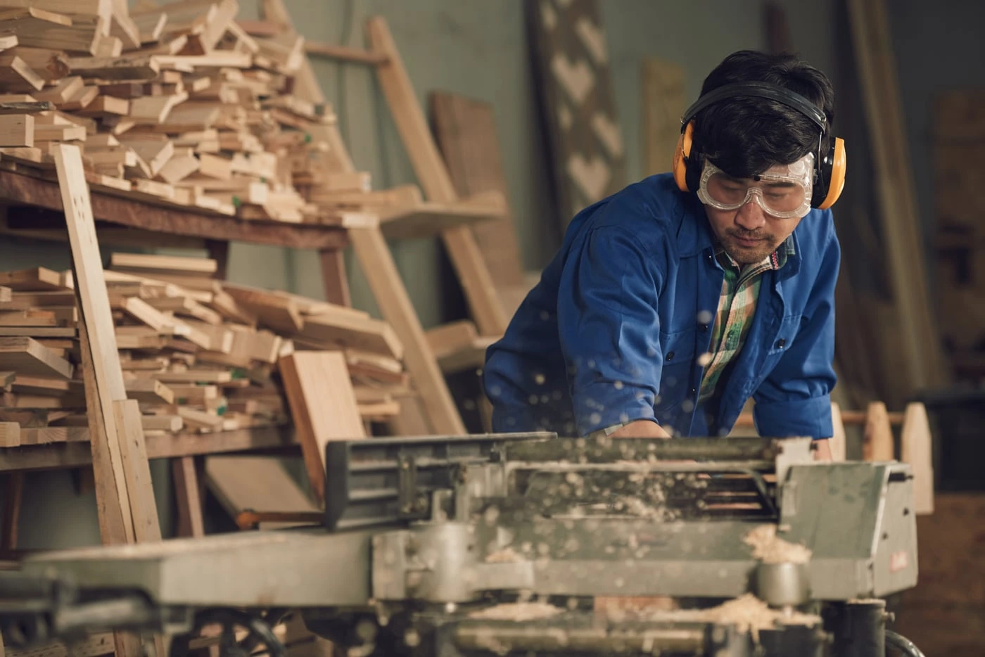 A_man_operates_a_woodworking_machine_focused_on_shaping _ISM Training_and_Recruitment