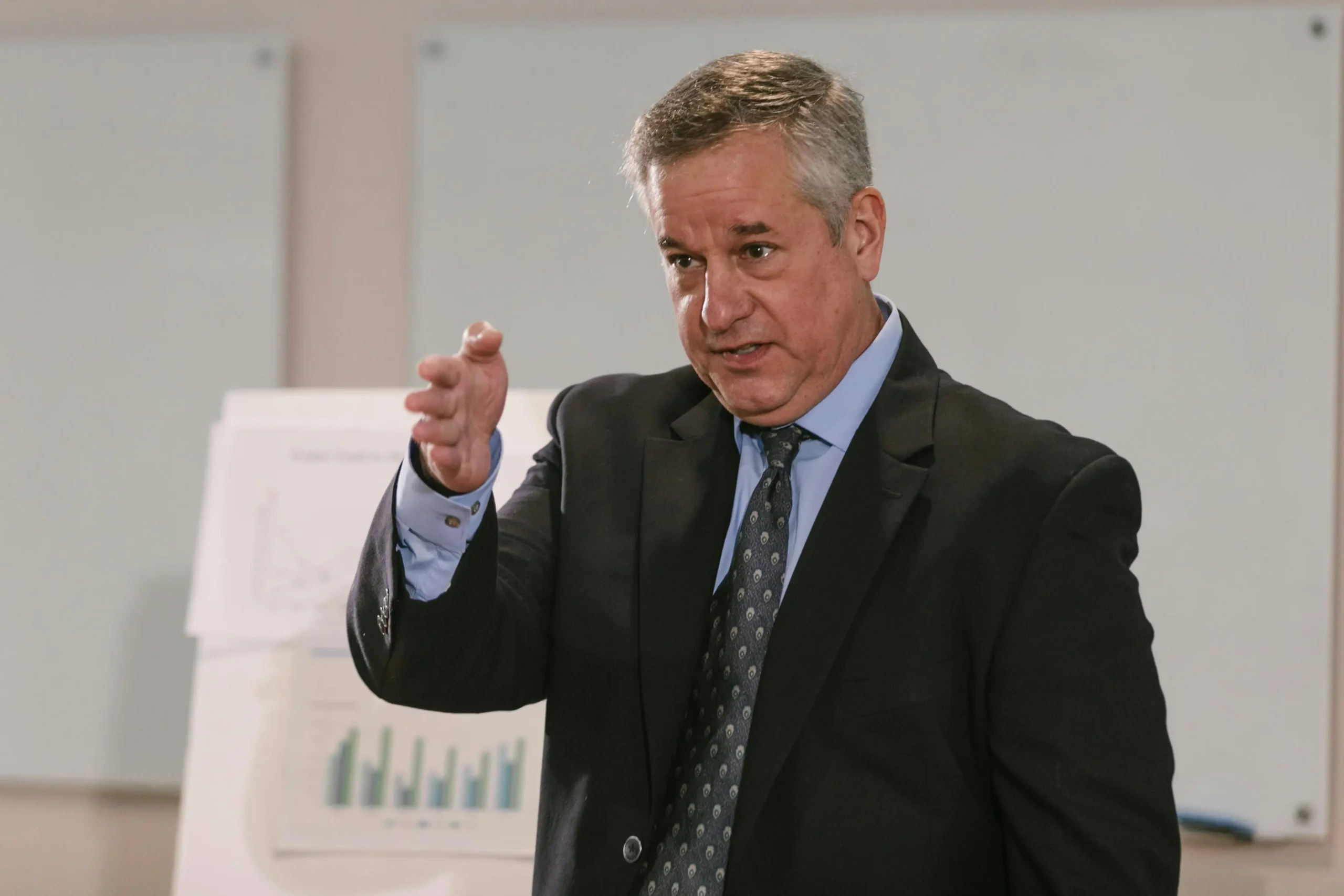 A_man_in_a_suit_and_tie _ISM Training_and_Recruitment