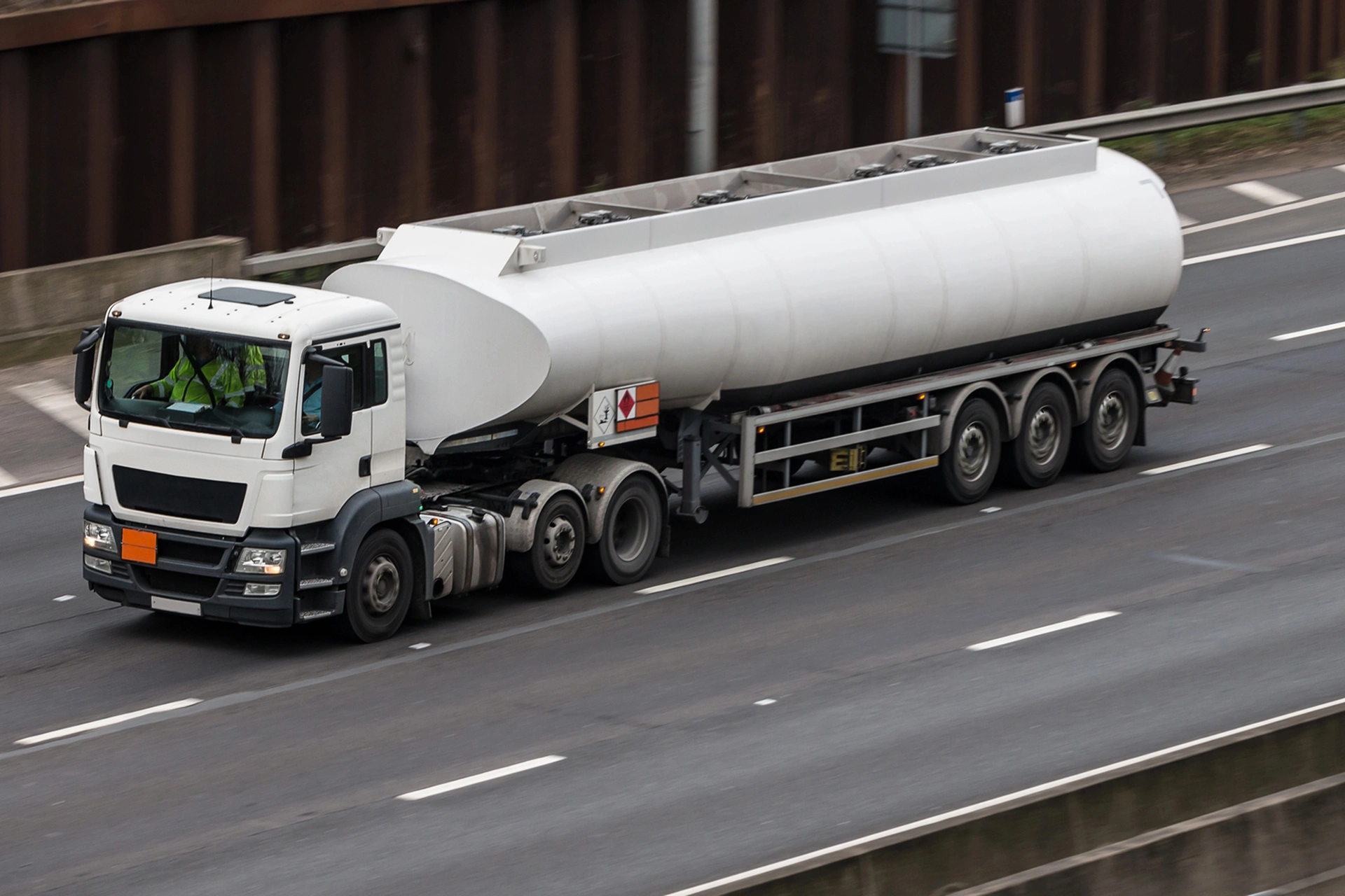 A_tanker_truck_traveling_along_a_highway _ISM Training_and_Recruitment