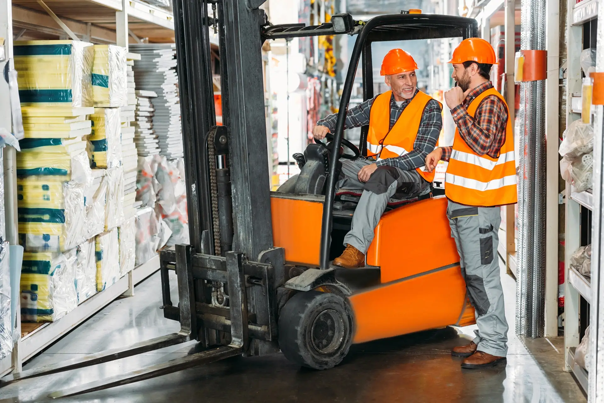 Two_men_are_working_together_on_a_forklift _ISM Training_and_Recruitment